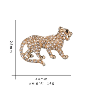 Detailed view of crystal-encrusted tiger brooch with 44mm by 25mm dimensions