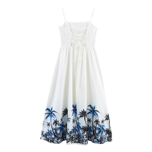 White vacation style maxi dress with blue palm tree prints and elegant lace-up back design