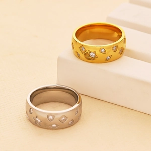 Elegant gold and silver stainless steel rings with star and eye cubic zirconia patterns