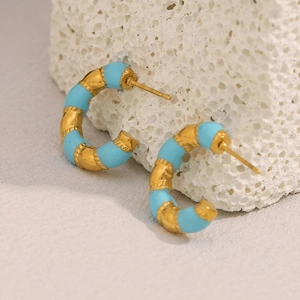 Elegant 18K gold-plated C-shaped earrings with blue enamel pattern on a stone base