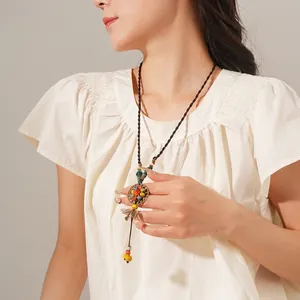 Bohemian ceramic beaded leaf pendant necklace with ethnic style woven cord for women