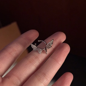 Minimalist silver butterfly ear bone clip with zircon crystals and hollow design