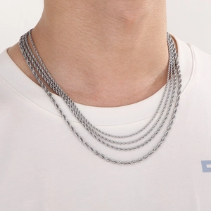 Layered silver twist chain necklaces in stainless steel for a minimalist hip-hop style