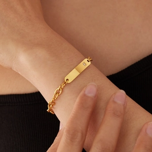 Elegant gold plated stainless steel bar bracelet with single zircon stone for women