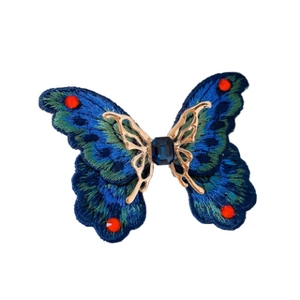 Vintage butterfly open ring with blue rectangle gemstone and green embroidery textures