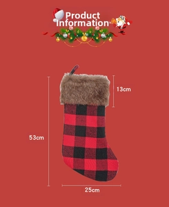 Detail view of large red and black plaid Christmas stocking with brown faux fur trim