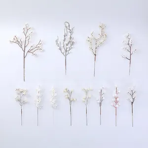 Detailed catalog of twelve various artificial white berry stems for holiday home decor