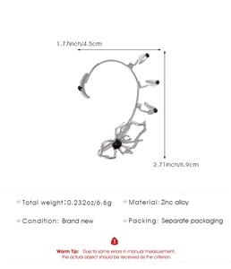 Detailed view of silver spider ear cuff with dimensions 4.5cm by 6.9cm in zinc alloy