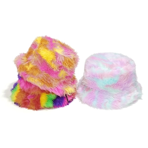 Rainbow tie-dye plush bucket hats in colorful faux fur for winter warmth and style