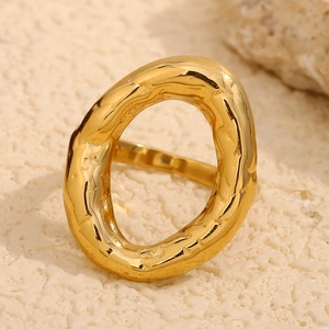 Detailed view of 18K gold plated stainless steel ring with hammered organic texture