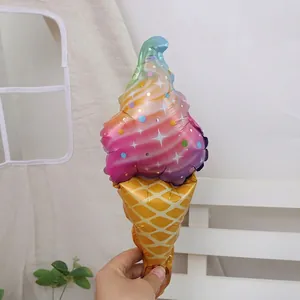 Detailed view of rainbow gradient ice cream foil balloon with cone pattern and star print