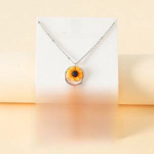 Silver chain sunflower pendant necklace displayed on a white inspirational gift card