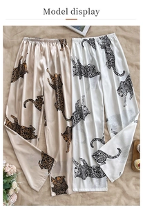 Detail of silk-like ice silk pajama pants with leopard print and elastic waistband