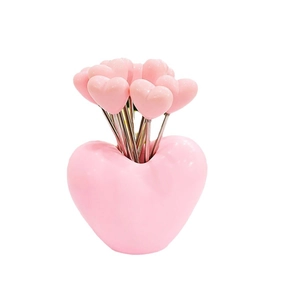 Pink heart-shaped stainless steel fruit fork set with a decorative base stand