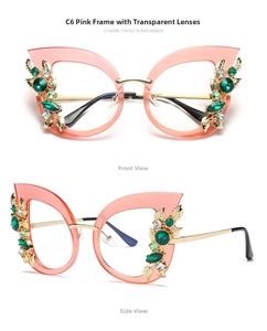 Detail of pink cat eye frames with emerald green crystals and leaf-shaped metal décor