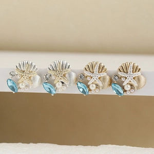 Set gioielli marini con orecchini a stella marina, perle e cristalli blu da donna