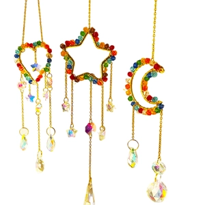 Golden suncatcher set with crystal hearts, stars, and moons for balcony decor