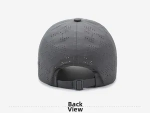 Detail of dark grey baseball cap with laser-cut ventilation holes and adjustable back buckle