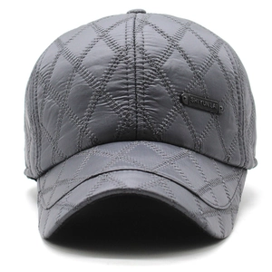 Men's winter quilted baseball cap in dark grey with warm ear flaps and metal tag