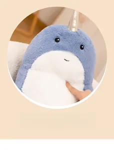 Detail view of the narwhal plush toy showing high elastic slow rebound material