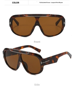 Detail view of large leopard print aviator sunglasses with signature T-metal hinges