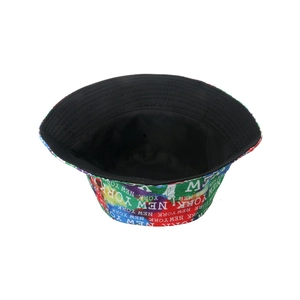 Double-sided rainbow tie-dye bucket hat with white NEW YORK typography patterns