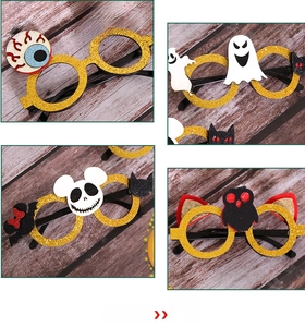 Detail view of four Halloween novelty glasses including skull, ghost, and owl designs