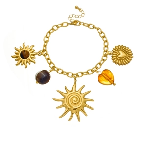 Gold chain bracelet with sun and heart charms featuring tiger eye and amber stones