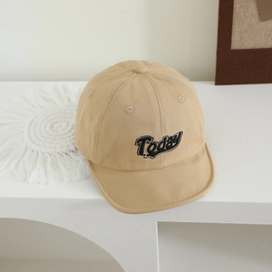 Macro detail of khaki baby baseball cap with black Today embroidery and soft cotton texture