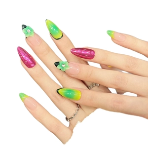 Handmade stiletto press-on nails with 3D floral designs and colorful gradient finish
