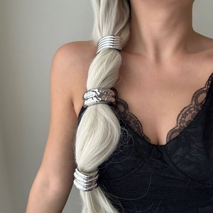 Three-piece silver alloy metal hair rings set for ponytails shown on model