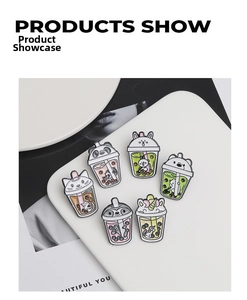 Set of six cute enamel pins featuring animals in bubble tea cups on display
