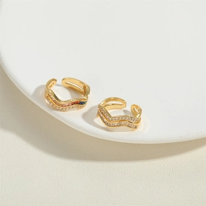 Set of two adjustable wavy gold rings with colorful and white zircon gemstones