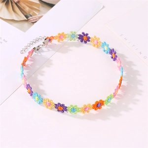 Close-up of colorful embroidered flower choker with silver adjustable lobster clasp