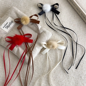 Winter ballet style ribbon hair clips with fur balls and bows in four colors