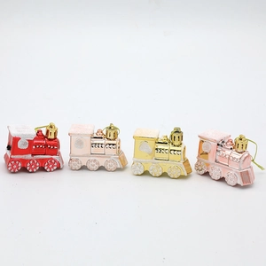 Set of four glittering Christmas train ornaments in red, silver, gold, and pink colors