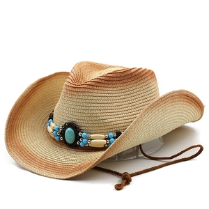 Detail of cowboy straw hat with turquoise beads and adjustable chin strap cord