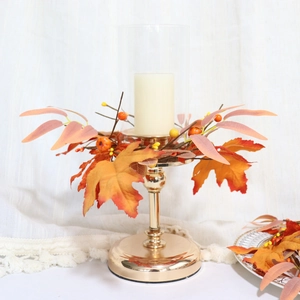 Autumn maple leaf candle holder with orange berries and gold base for fall decor