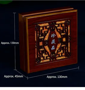 Close-up of retro wooden gift box with hollow pattern and glowing inner LED light