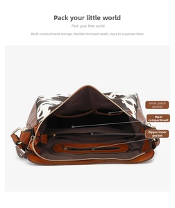 Interior view of cow print tote bag showing multiple compartments and golden zippers