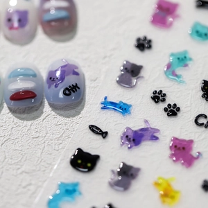 3D embossed nail art stickers featuring colorful cute cat, paw, and fish bone designs