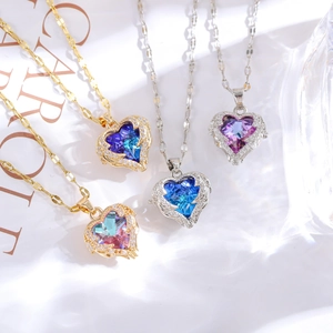 Titanium steel heart necklaces with ocean blue crystals and angel wing micro-pave details