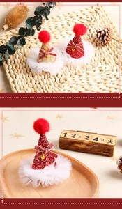 Detail of glitter Christmas hat hair clips with lace trim and gold bells for holiday decor