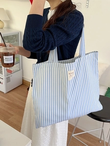 Blue and white striped canvas tote bag with large capacity for daily commuting