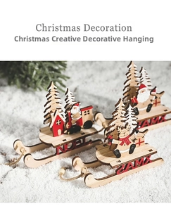 Detailed view of laser-cut wooden Christmas sleigh featuring Santa, reindeer and pine trees