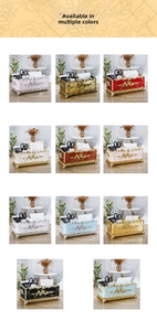 Détail de boîte à mouchoirs style européen avec motifs gravés et compartiments de rangement