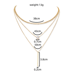 Detailed layered necklace dimensions showing 38cm, 43cm, 50cm gold chains and bar pendant