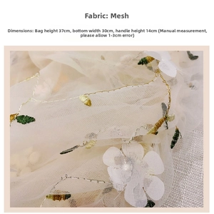 Detail of mesh bag with 3D flower embroidery, 37x30cm size, and metallic gold thread