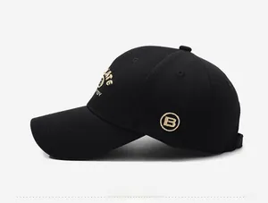 Side view of black cotton baseball cap showing golden 'B' embroidery and structured profile