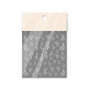 3D embossed white floral nail art stickers with vine patterns in retail packaging